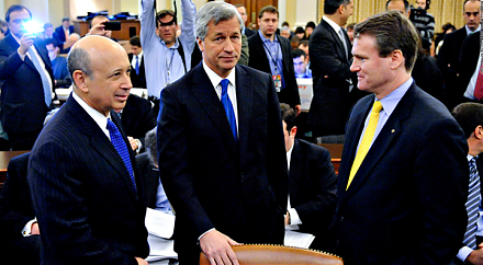 Goldman Sachs takes a $5 billion net income hit that results from its offshore cash repatriation under the Trump tax law.