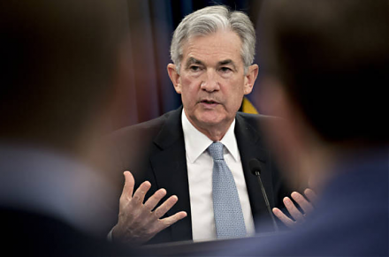 Fed Chair Jerome Powell hints slower interest rate increases because the current rate is just below the neutral threshold.