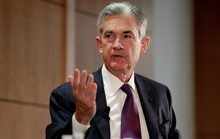 Fed Chair Jay Powell suggests that the recent surge in U.S. business debt poses moderate risks to the economy.